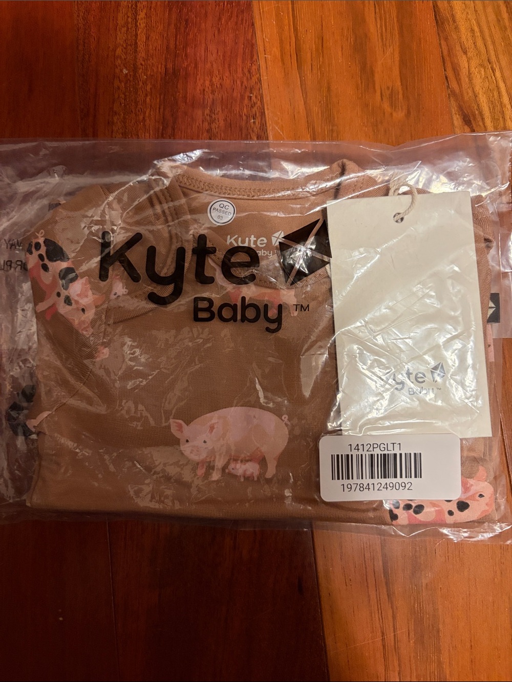 Kyte baby new pig 0-3month long sleeve bodysuit